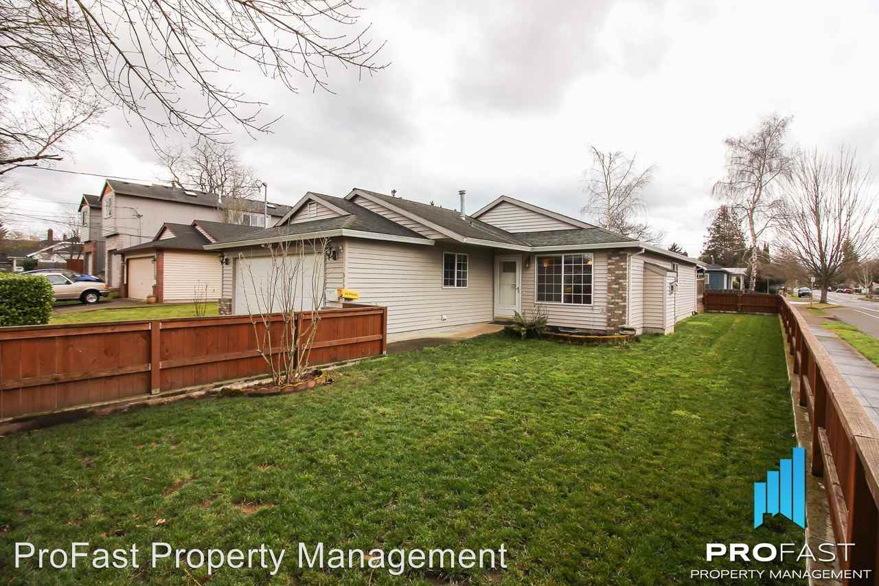 9137 N Polk Ave - Photo 3 of 30