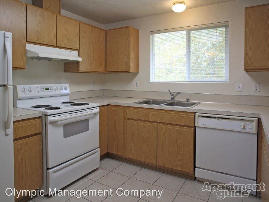 TRAILSIDE 3806 12TH AVE SE - Photo 2 of 16