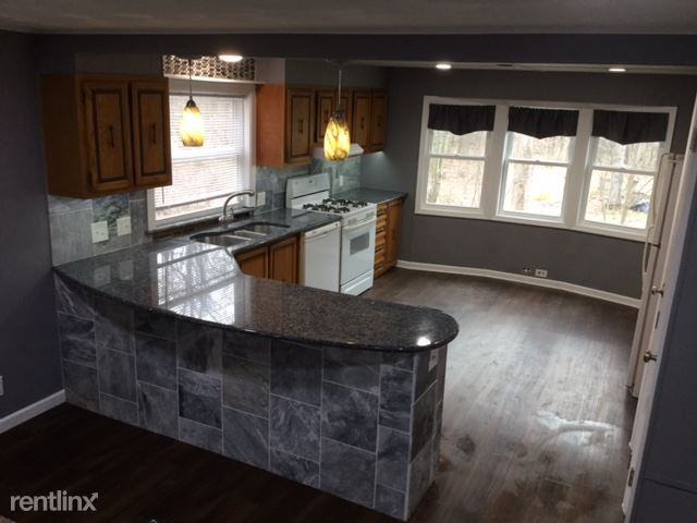 5950 Grosvenor St NE - Photo 2 of 10