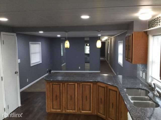 5950 Grosvenor St NE - Photo 3 of 10