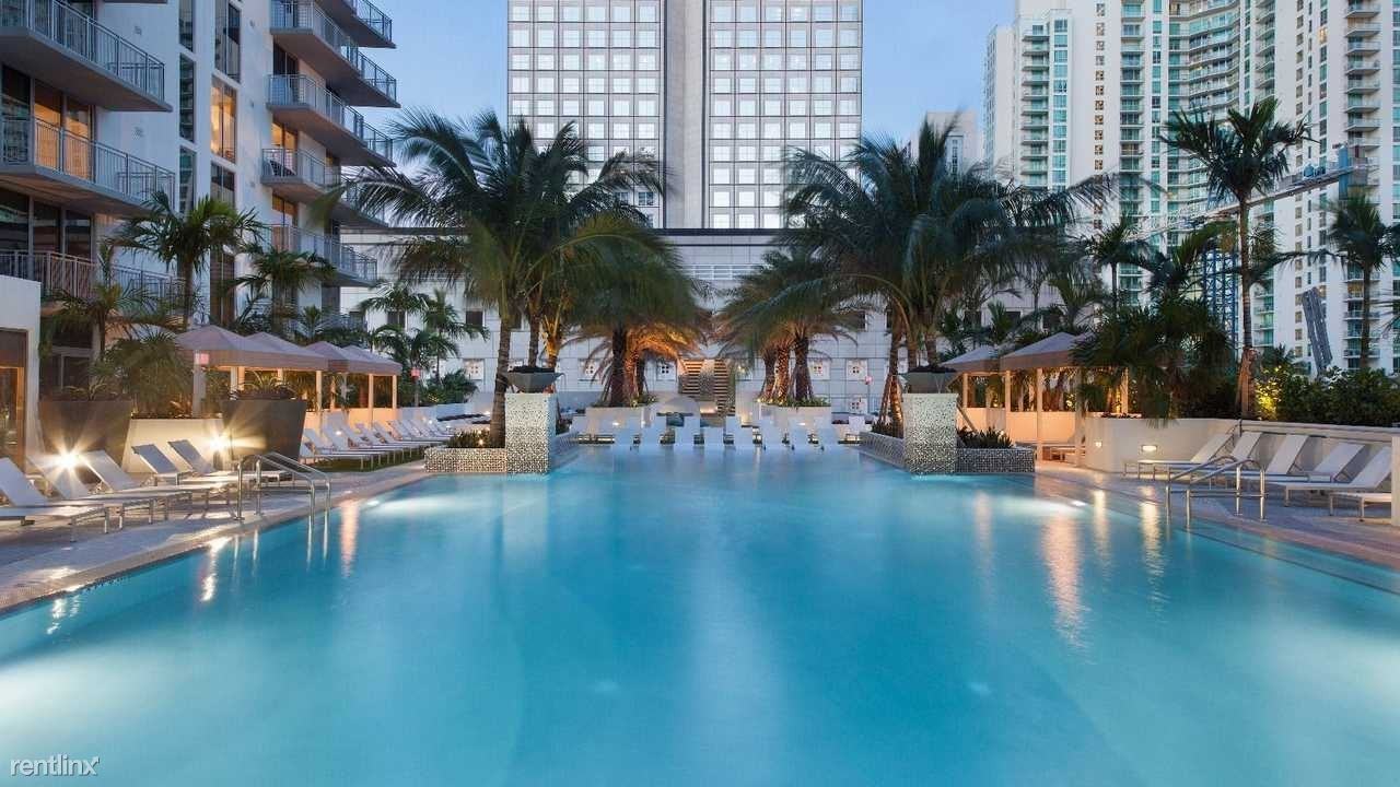 225 SE 2nd St - Photo 2 of 16