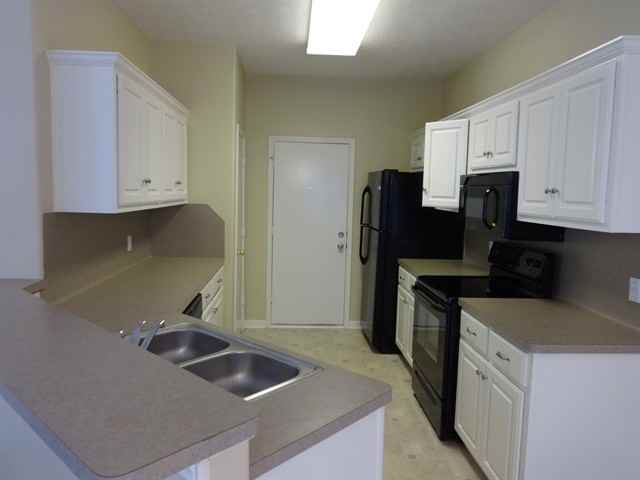 9010 Dolphin Cir - Photo 3 of 13