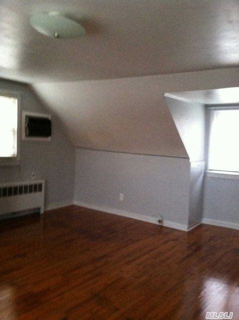 154 E 2nd St - Photo 2 of 7