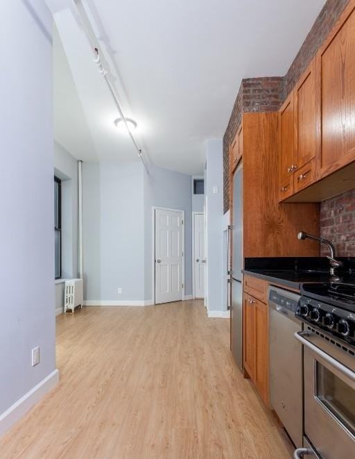 358 West 51st St - Photo 2 of 4