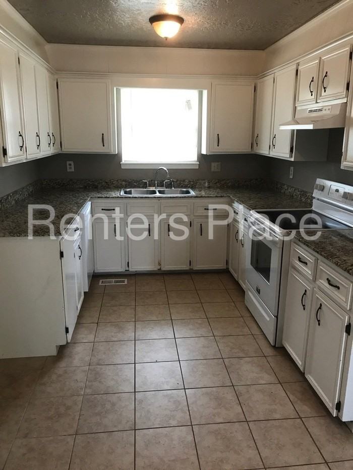 8310 E 65th Pl - Photo 3 of 11