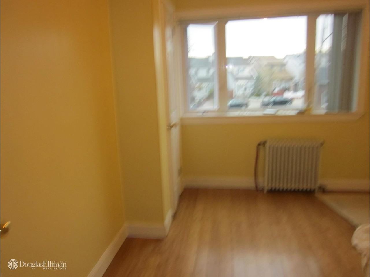 59-70 58th Ave 2 - Photo 2 of 3