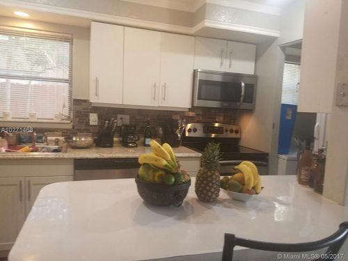 5880 NW 16th Ct - Photo 2 of 8