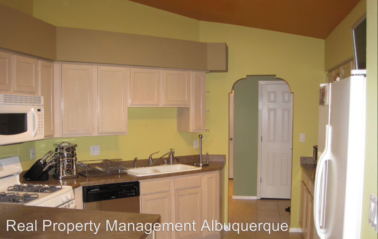 6608 Honeylocust Ave NW - Photo 3 of 13