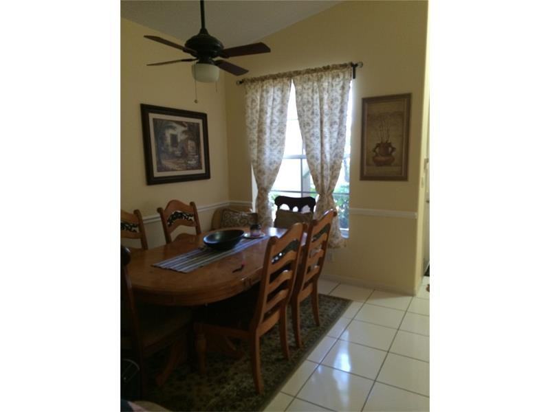 12145 Northwest 59th Street - Photo 2 of 6