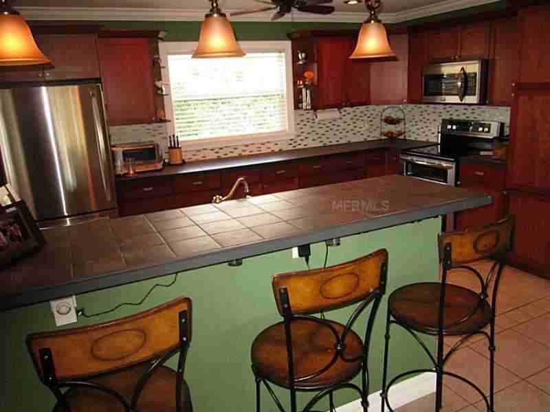 11017 64th Terrace N - Photo 3 of 12