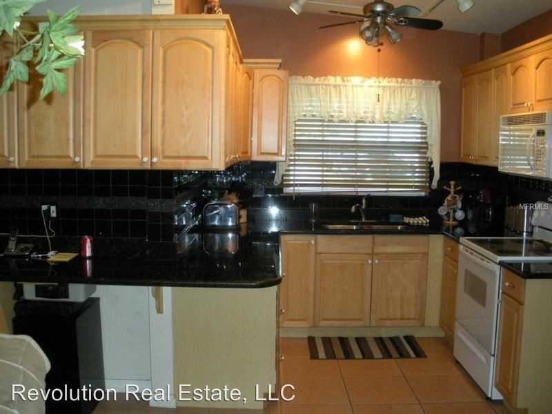 871 74th Ave N - Photo 3 of 9