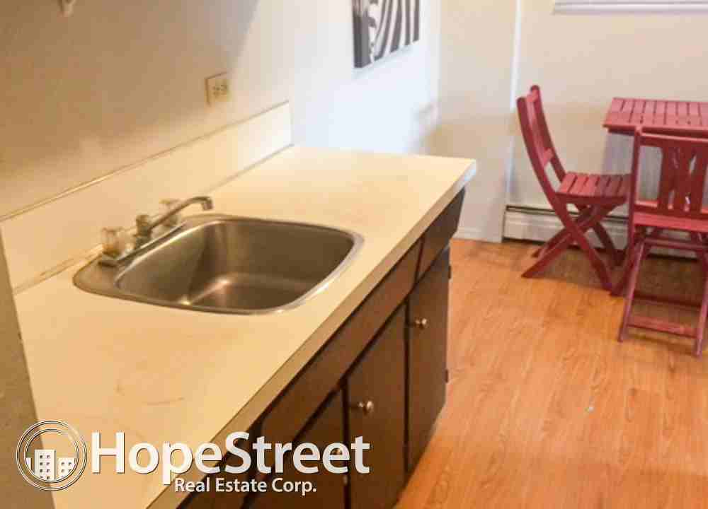 717 17 Avenue NW - Photo 3 of 7