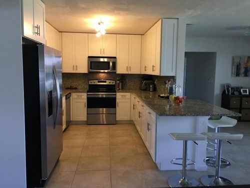 7700 Pine Tree Ln - Photo 2 of 8