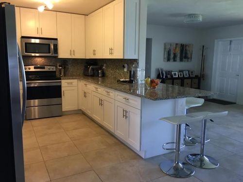 7700 Pine Tree Ln - Photo 3 of 8