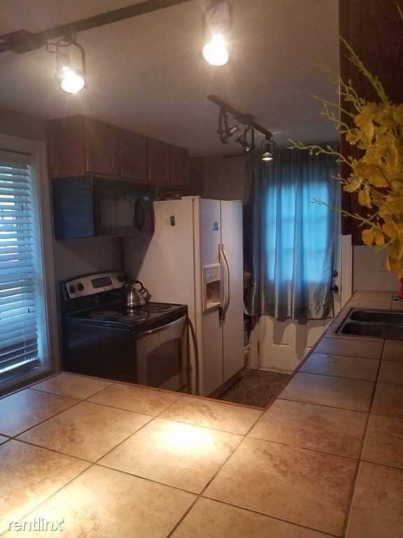 7711 W 64th Terrace - Photo 2 of 7