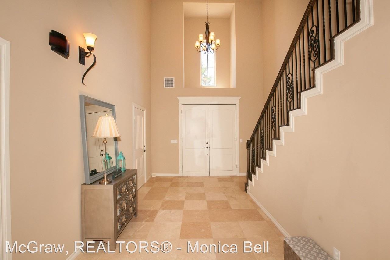 6018 E 76th Ct - Photo 3 of 35