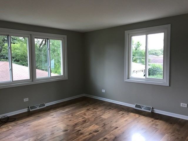 8281 N Ozanam Ave - Photo 3 of 20