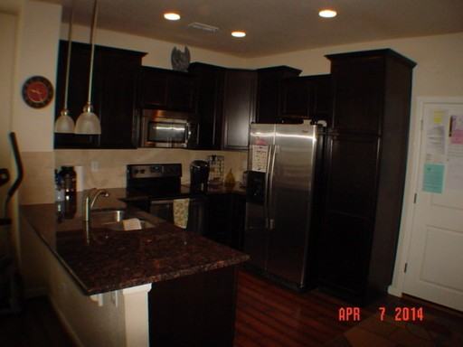 16132 W 63rd Ln #E - Photo 3 of 11