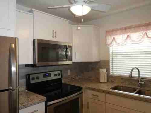 9855 Sandalfoot Blvd #306 - Photo 3 of 4