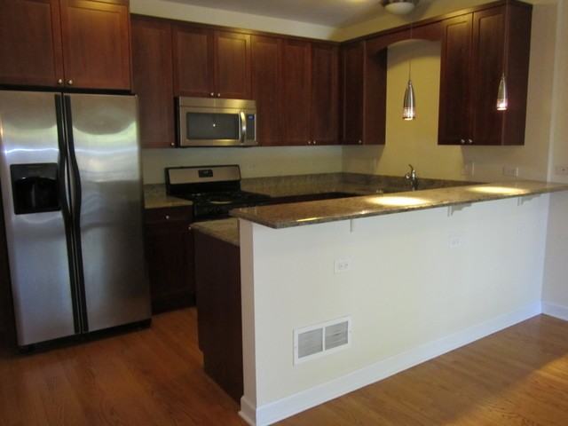 6521 N Oketo Ave #1 - Photo 2 of 16