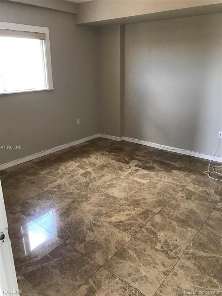 2740 SW 28th Ter - Photo 3 of 6