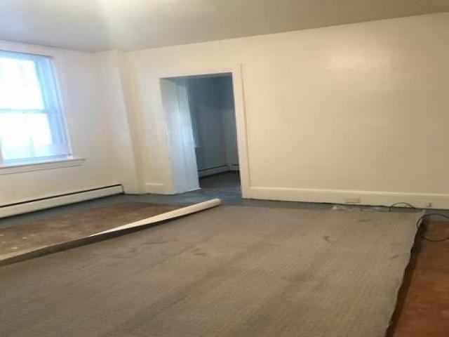 1107 W Poplar St - Photo 3 of 4