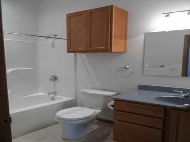 123 E 3rd St - Photo 2 of 6