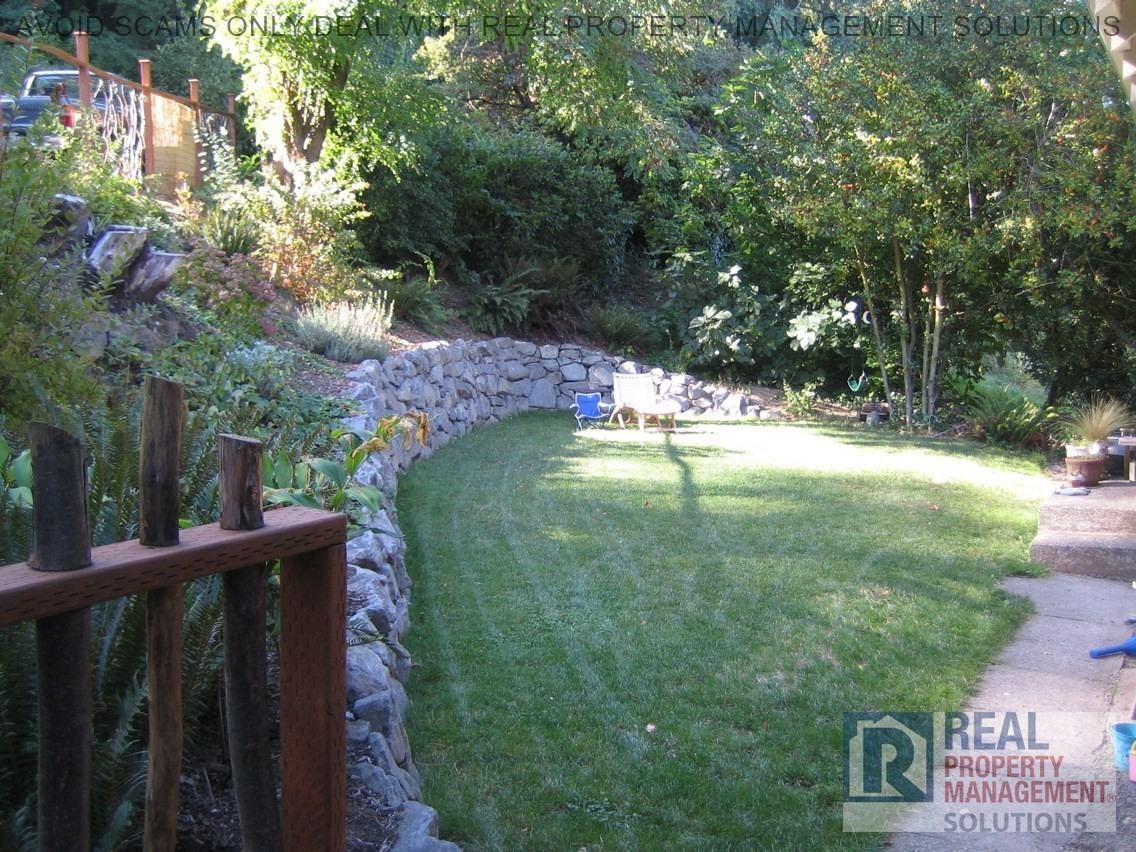10035 NW Wilark Ave - Photo 3 of 29