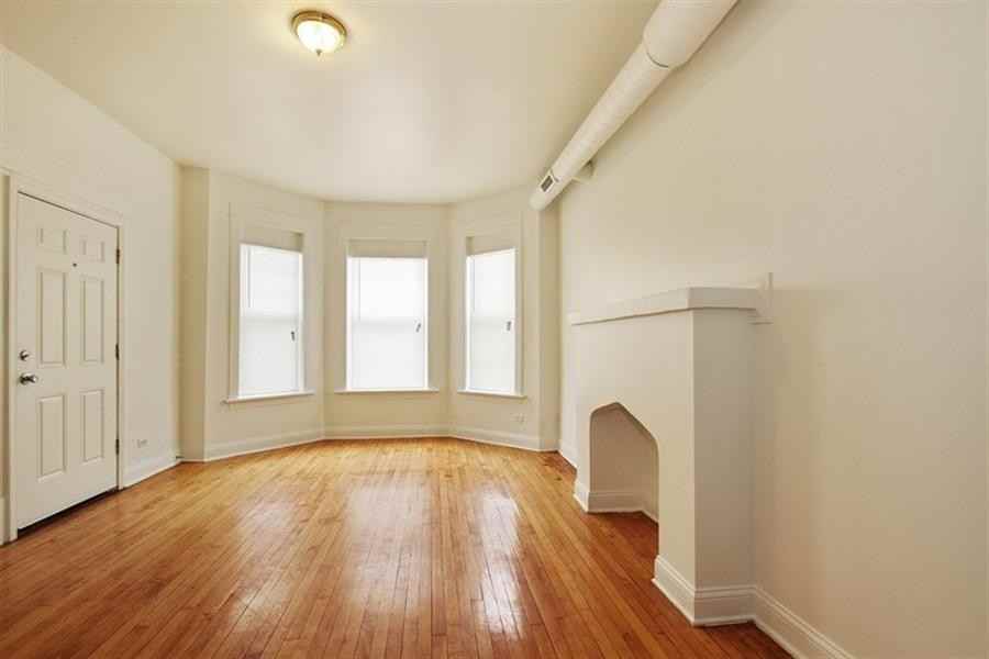 8257 S Coles Ave - Photo 2 of 6