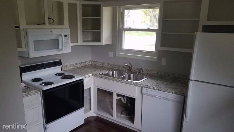 7129 NW Country Club Ln - Photo 3 of 4