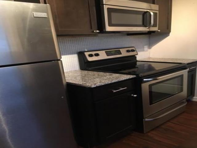 1120 NW 44th St - Photo 3 of 6