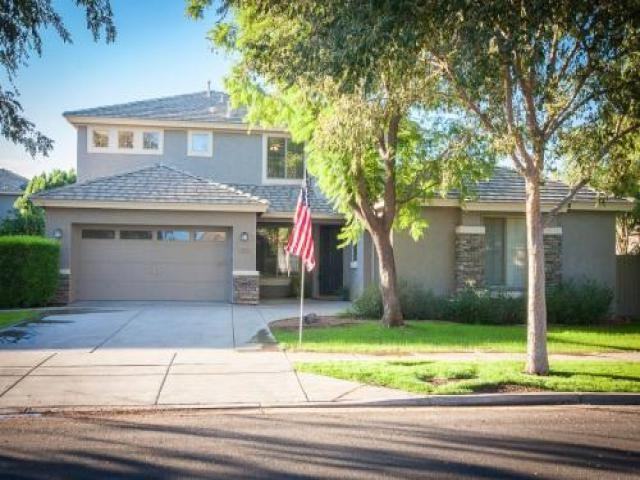 3565 E Vaughn Ct - Photo 2 of 6