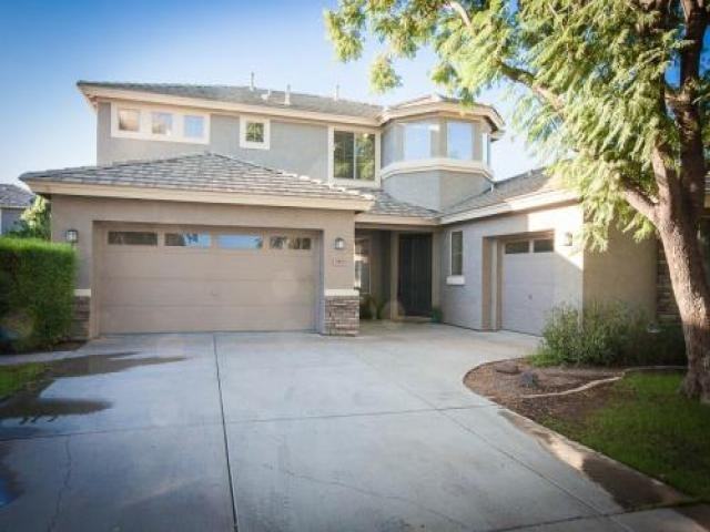 3565 E Vaughn Ct - Photo 3 of 6