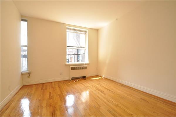 122 E 27th St - Photo 3 of 4