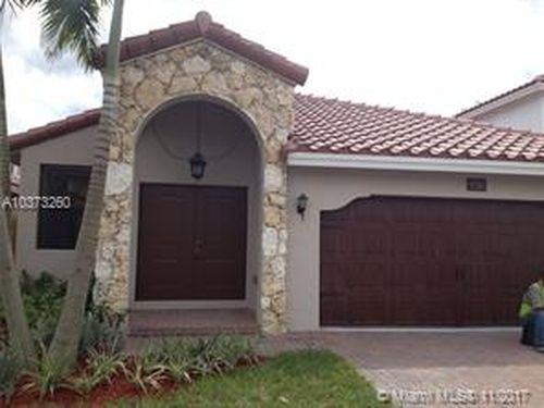 9780 NW 8th St #9780NW8TE - Photo 2 of 8