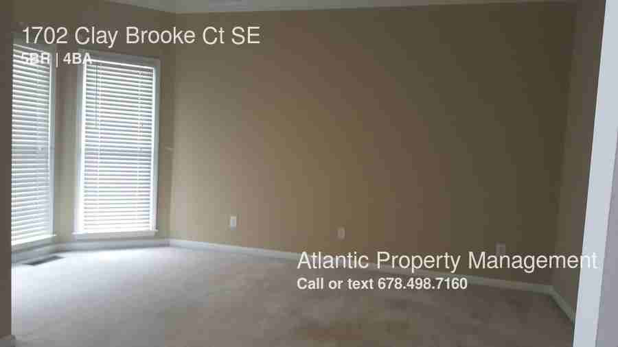 1702 Clay Brooke Ct SE - Photo 2 of 23