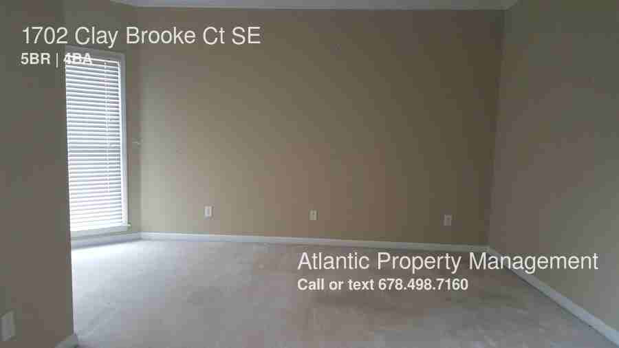 1702 Clay Brooke Ct SE - Photo 3 of 23