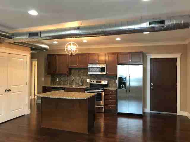 Century Place Apartments - Cadis Apartments - Photo 2 of 7