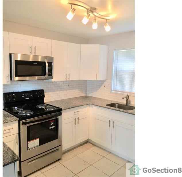 1441 NW 22nd St #20 - Photo 2 of 18