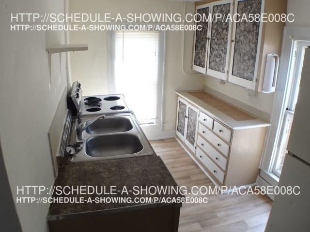 117 E Madison Ave #117-1-2 - Photo 3 of 5