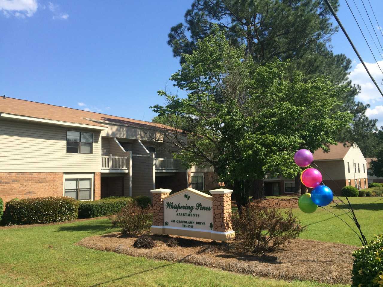 Whispering Pines Apartments - Photo 2 of 23