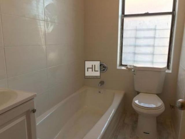 37-19 95th St - Photo 3 of 5