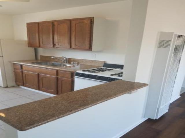 1980 E 68th St - Photo 3 of 6