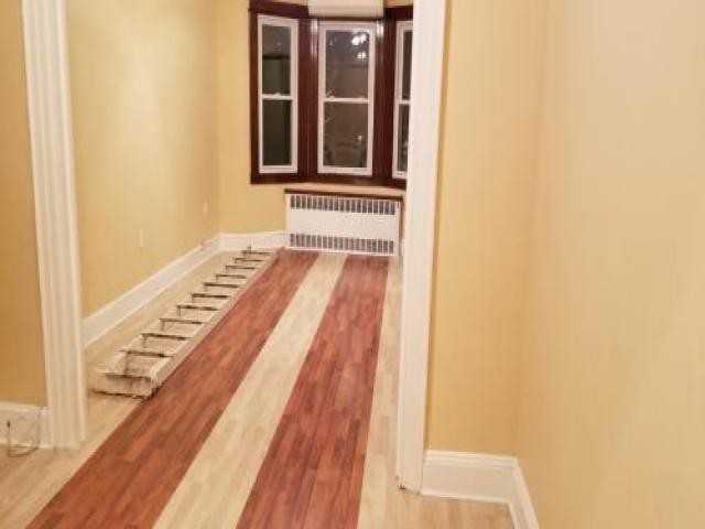 84-22 102nd St - Photo 2 of 6