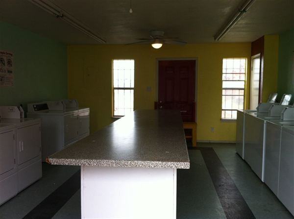 PALM GARDENS APARTMENTS - Photo 2 of 8