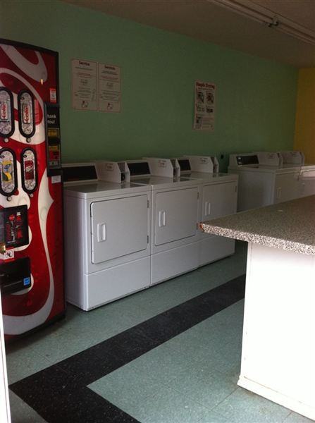 PALM GARDENS APARTMENTS - Photo 3 of 8