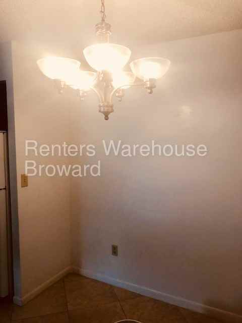 445 NW 210th St #101 - Photo 3 of 19