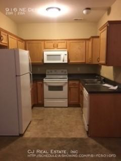 916 Northeast Deer Creek Road - Photo 3 of 7