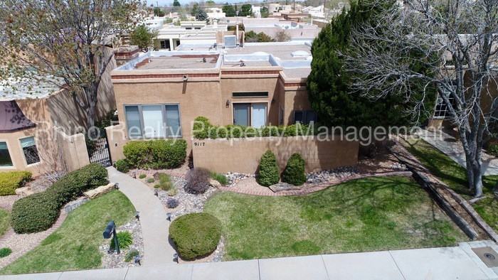 9117 Wimbledon Dr NE - Photo 2 of 50