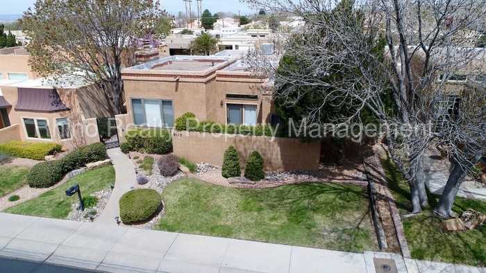 9117 Wimbledon Dr NE - Photo 3 of 50